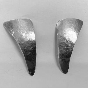 Hammered silver light weight metal pierced earrings.